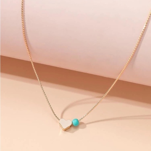 Heart Pendant Necklace with light blue bead on Gold Tone Chain - Picture 4 of 7